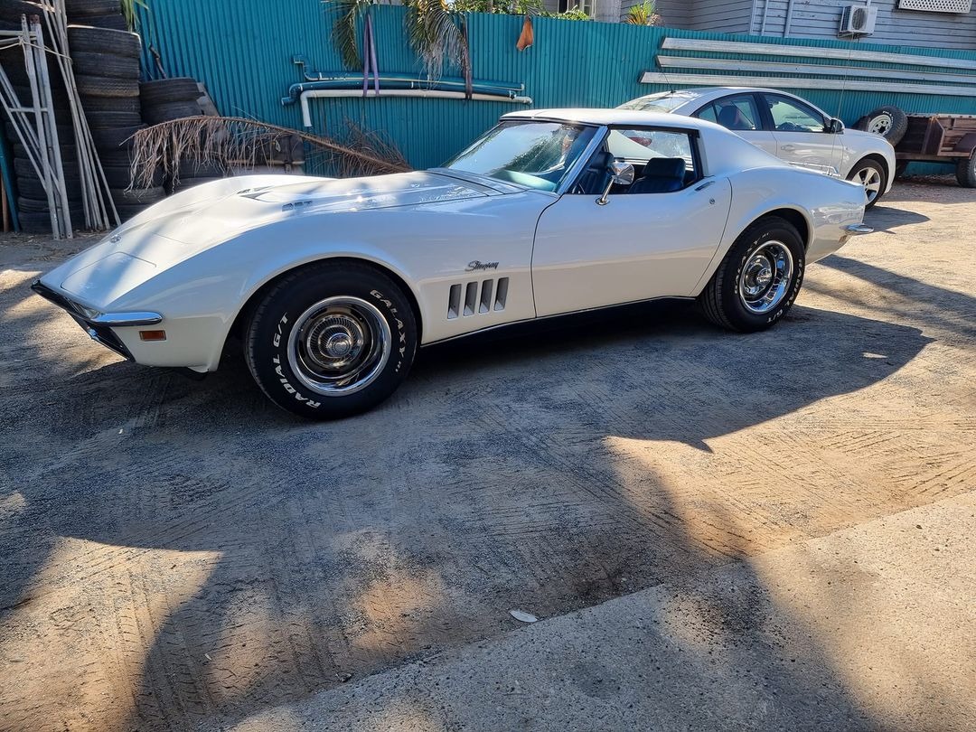 A white Chevrolet Corvette Stingray parked in the yard at Ignition Tyre and Auto in Yeppoon